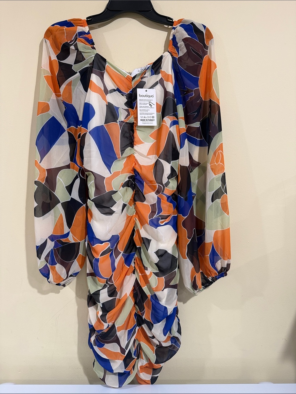 Boutiqua Long Sleeve Ruched Abstract Print Dress in Orange/Blue